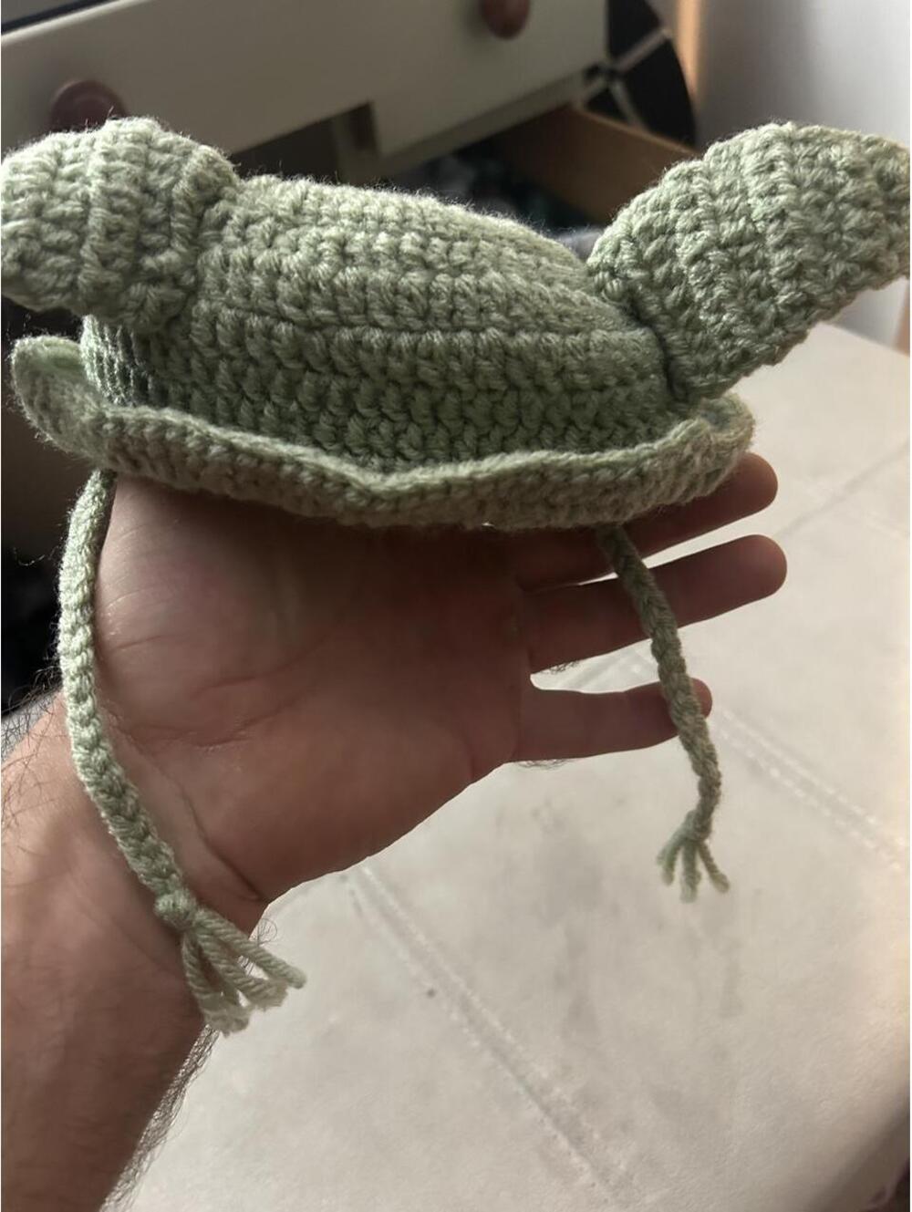 Green handmade crocheted Baby Yoda infant hat with ears